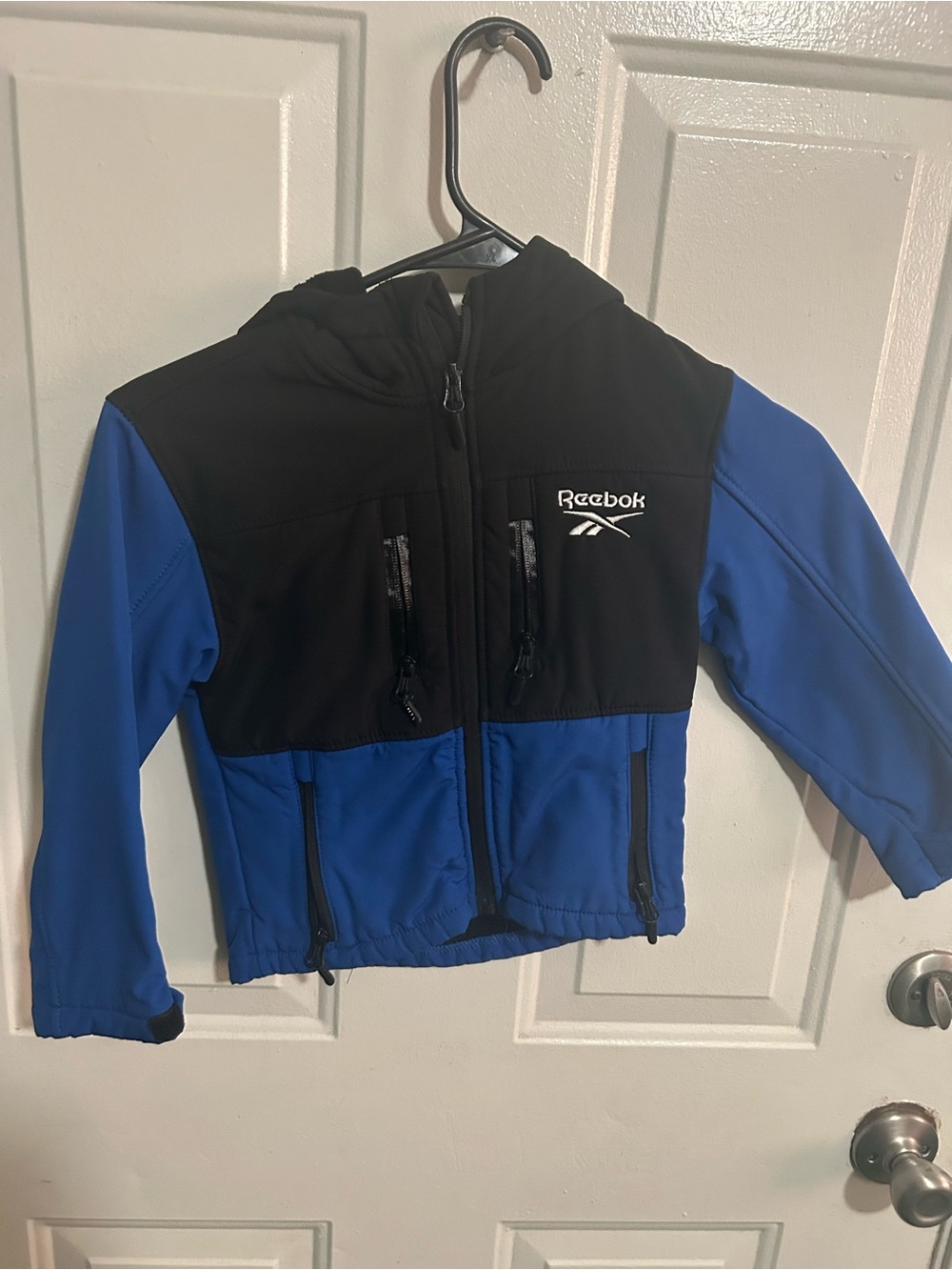 Reebok Boys' Jacket - Lightweight Polar Fleece
Lined Softshell Jacket with Hood